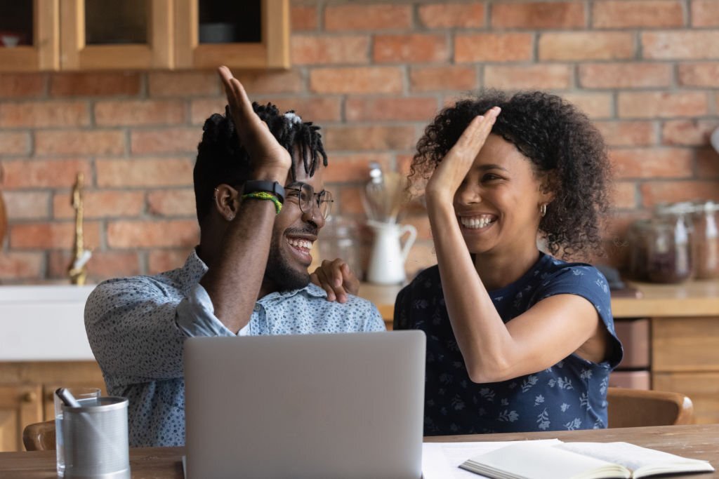 Young black couple making money online 