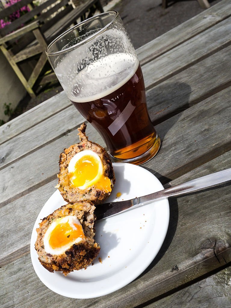 A scotch egg divided in two