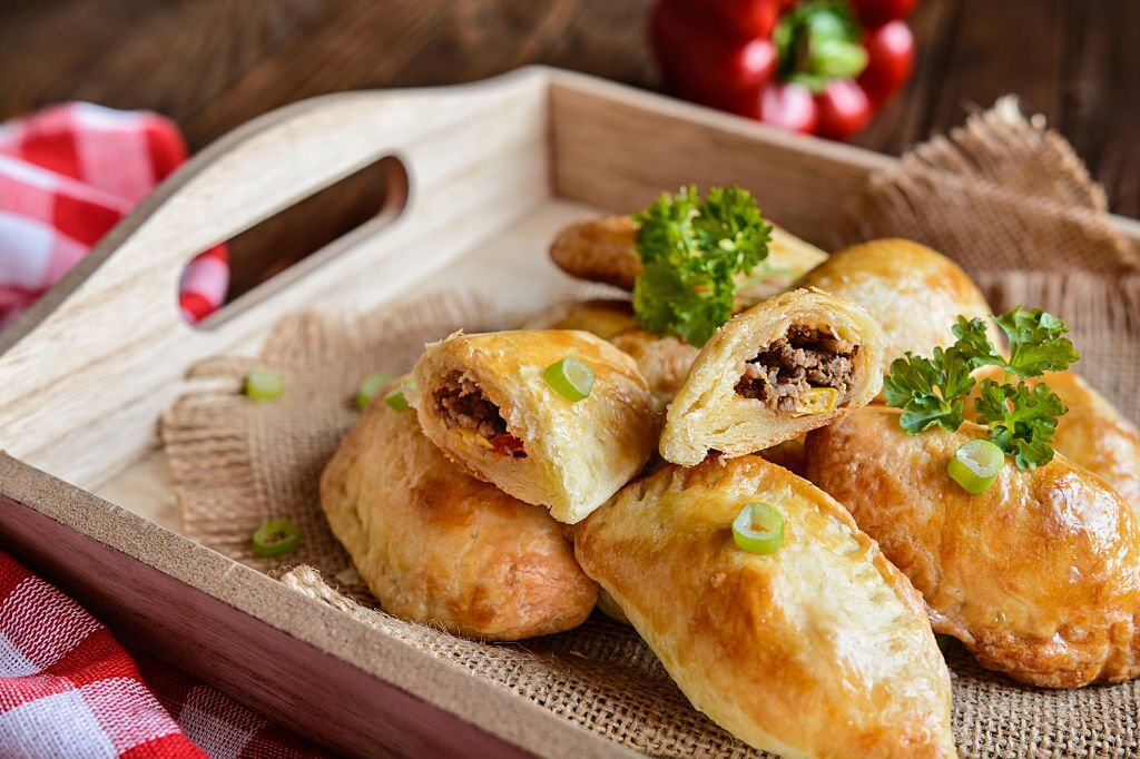 Nigeria meatpie In a wooden board