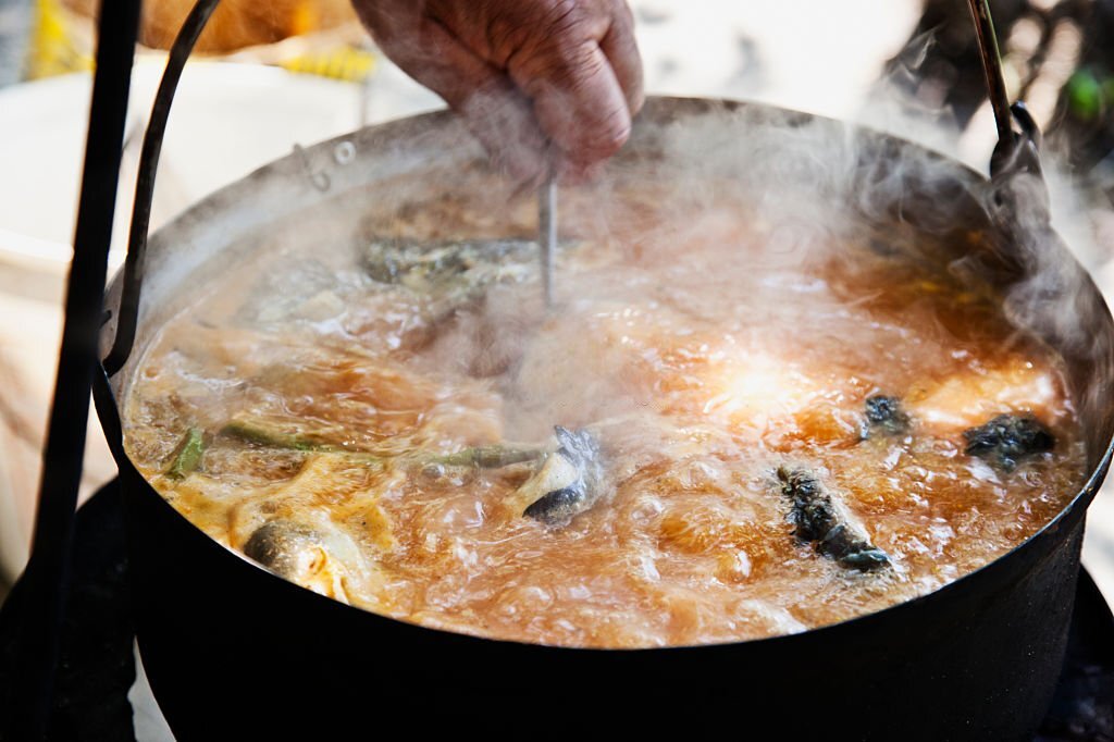 Yam and Catfish pepper soup in a cooking pot