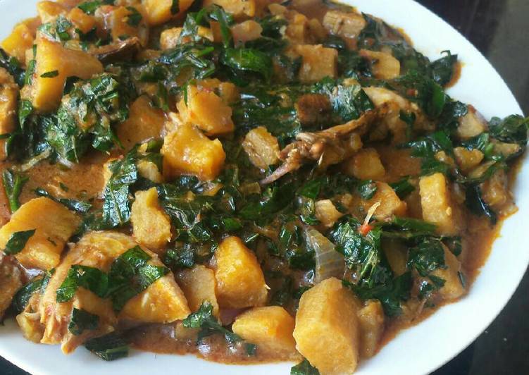 Plantain porridge with vegetables in a plate