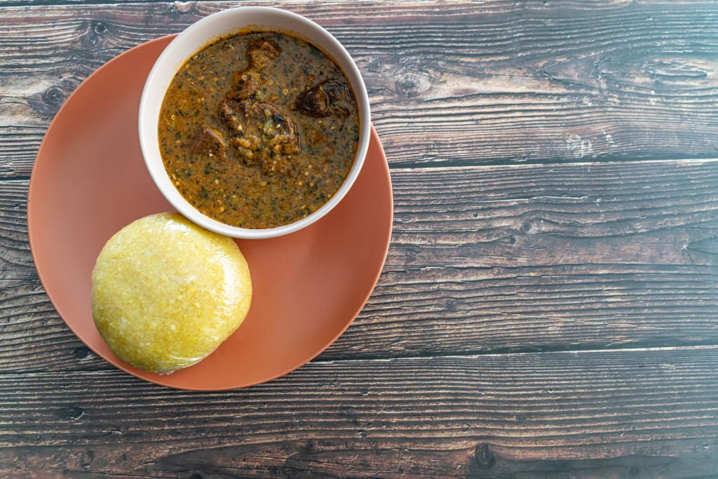 Nigerian Eba Served with ogbono Soup