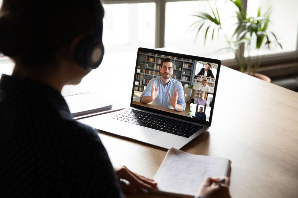 A student learning tech skills through a virtual class